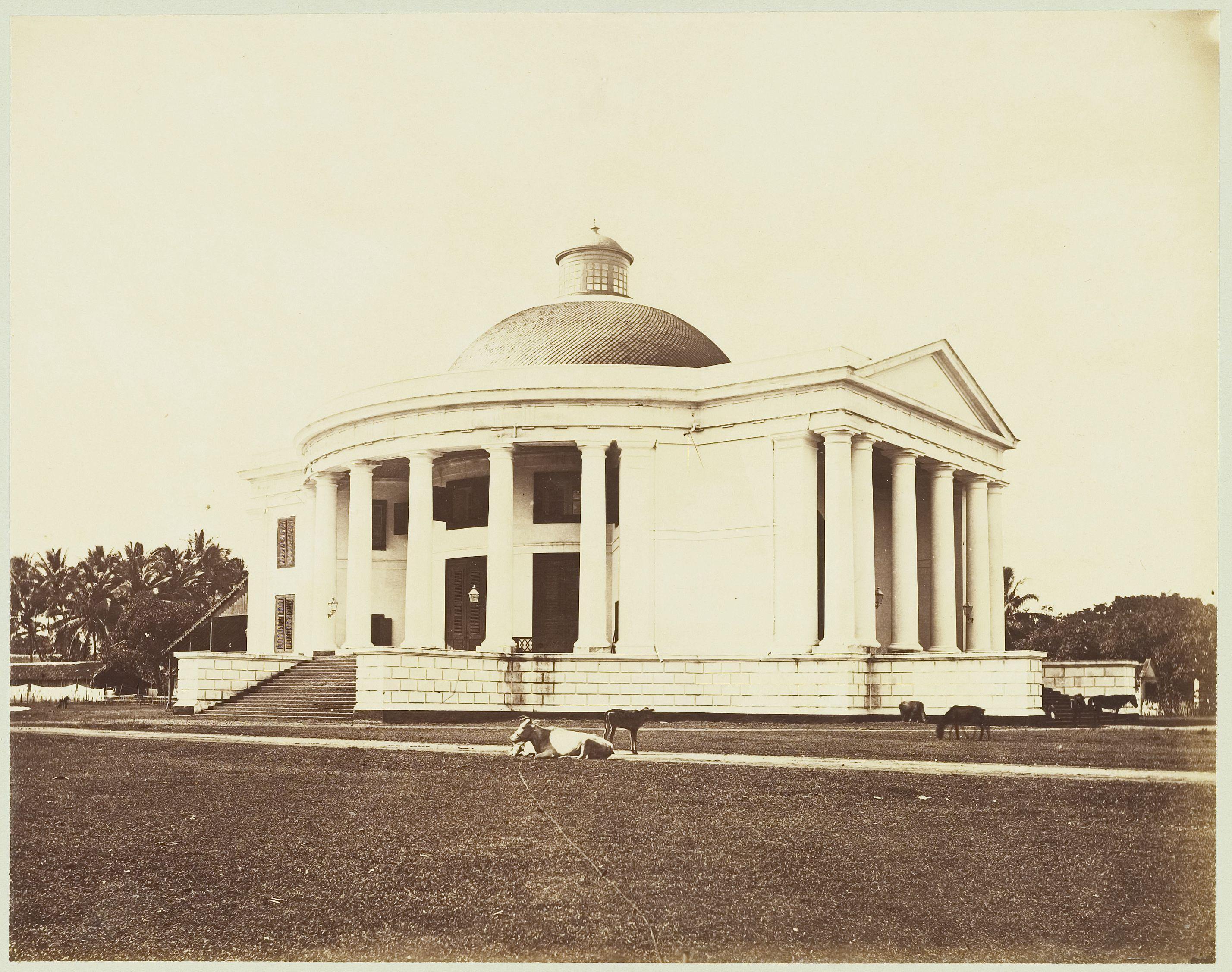 This photograph shows the Willemskerk in Batavia (present-day Jakarta) as it appeared in the middle of the 1860s. Construction of the church began in…