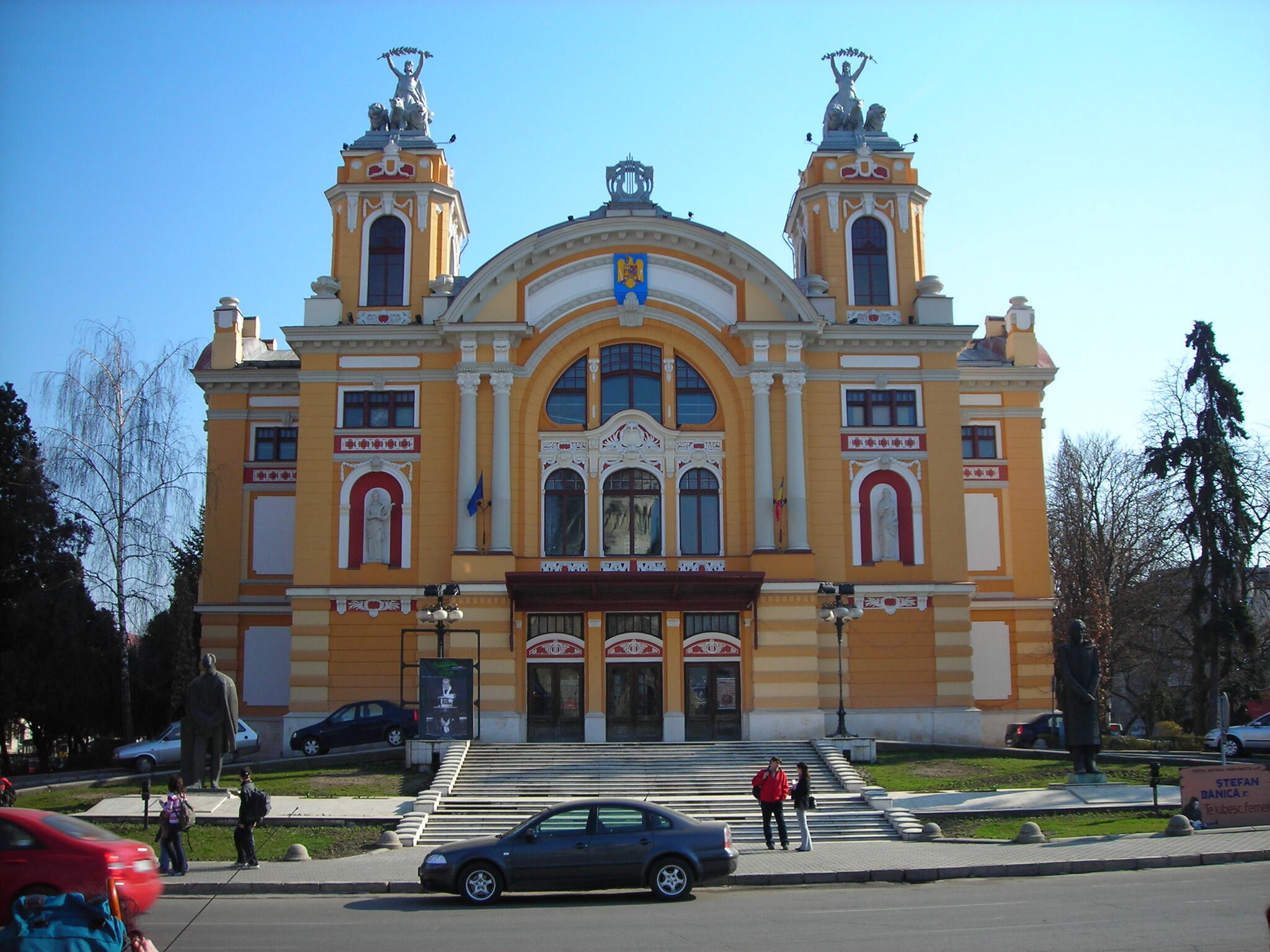 A picture of the National Theatre and National Romanian Opera of Cluj-Napoca building; taken after the re-painting of the building.