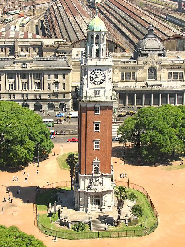 Torre Monumental (former name Torre de los Ingleses) at Plaza Fuerza Aérea Argentina in Buenos Aires. The tower reaches a height of 75.50 m (247 ft) and has eight floors. The Retiro Railway Station can be seen in the background.