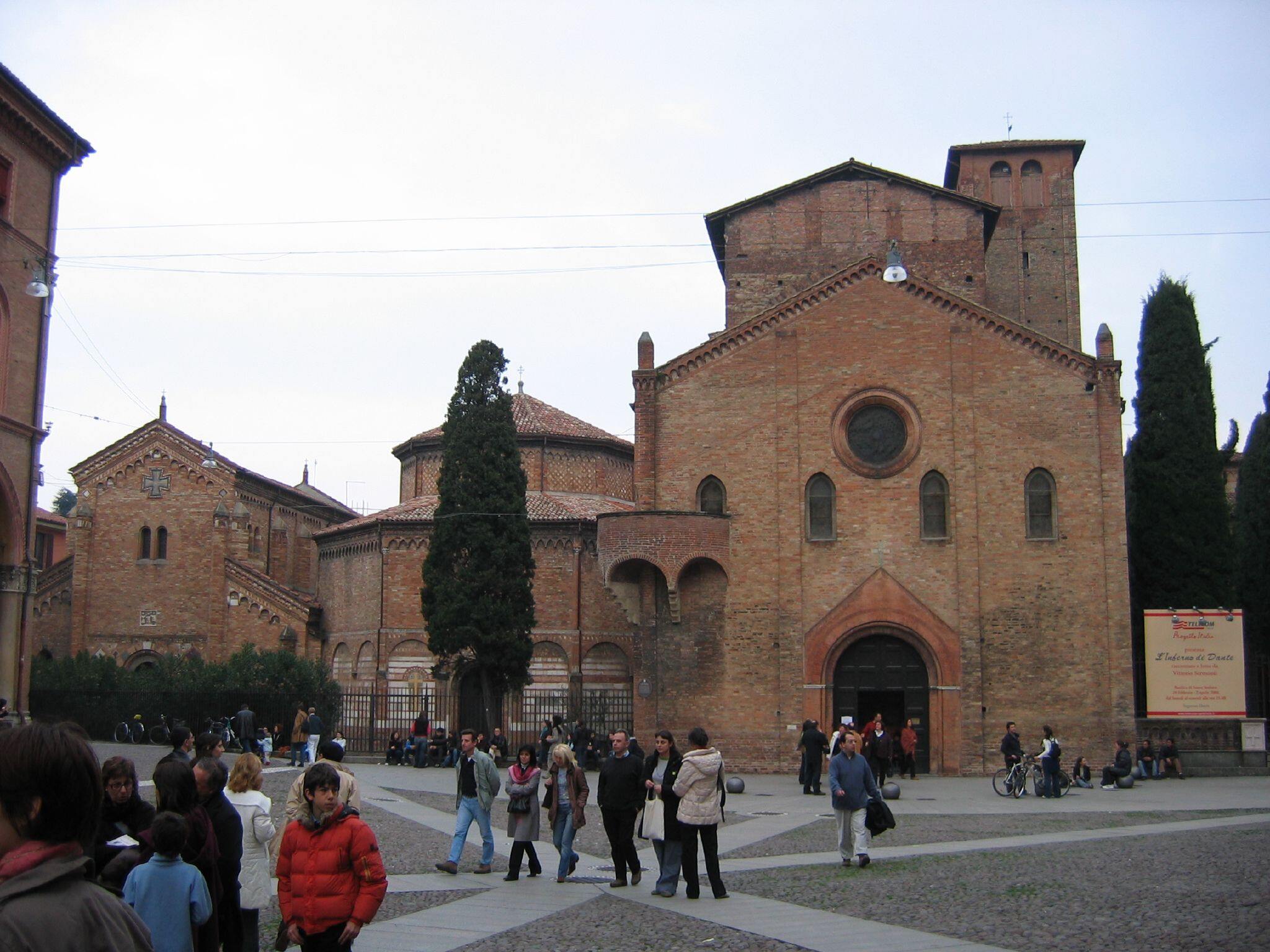 Buildings of Saint Stephen's Basilica in Bologna, Italy, also known as "The Seven Churches", in Piazza santo Stefano square. In this picture, the facade of the  "Chiesa del Crocifisso" (Church of the Crucifix). At left, the Basilica del Santo Sepolcro and the Basilica dei santi Vitale e Agricola.