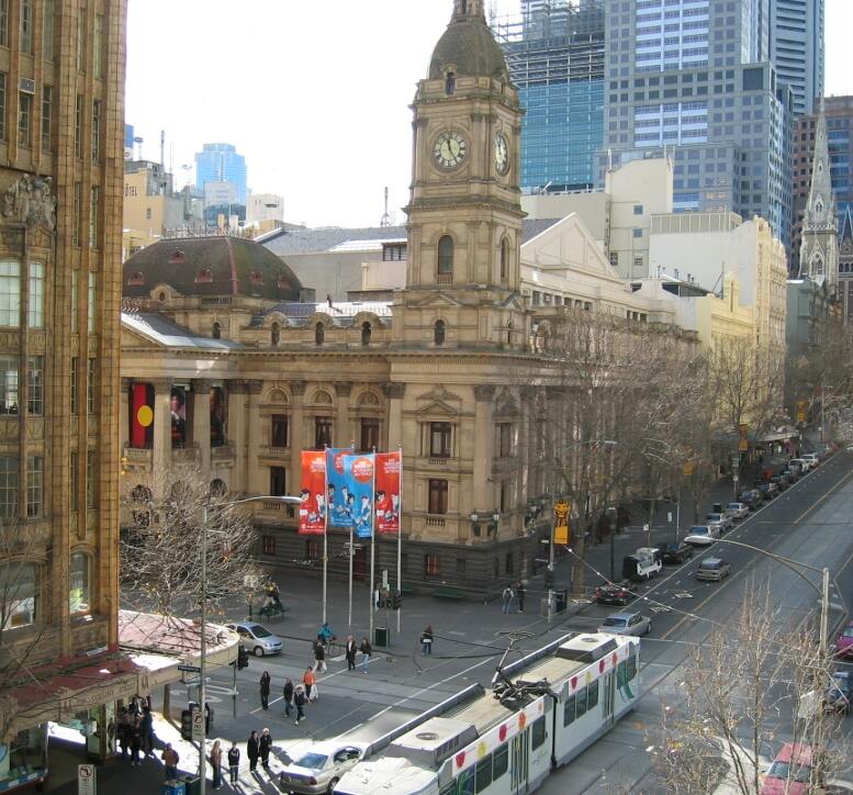 Looking east up Collins Street, Melbourne with Melbourne Town Hall on the right hand side. Photo taken by en:User:Adz on 11 July 2005