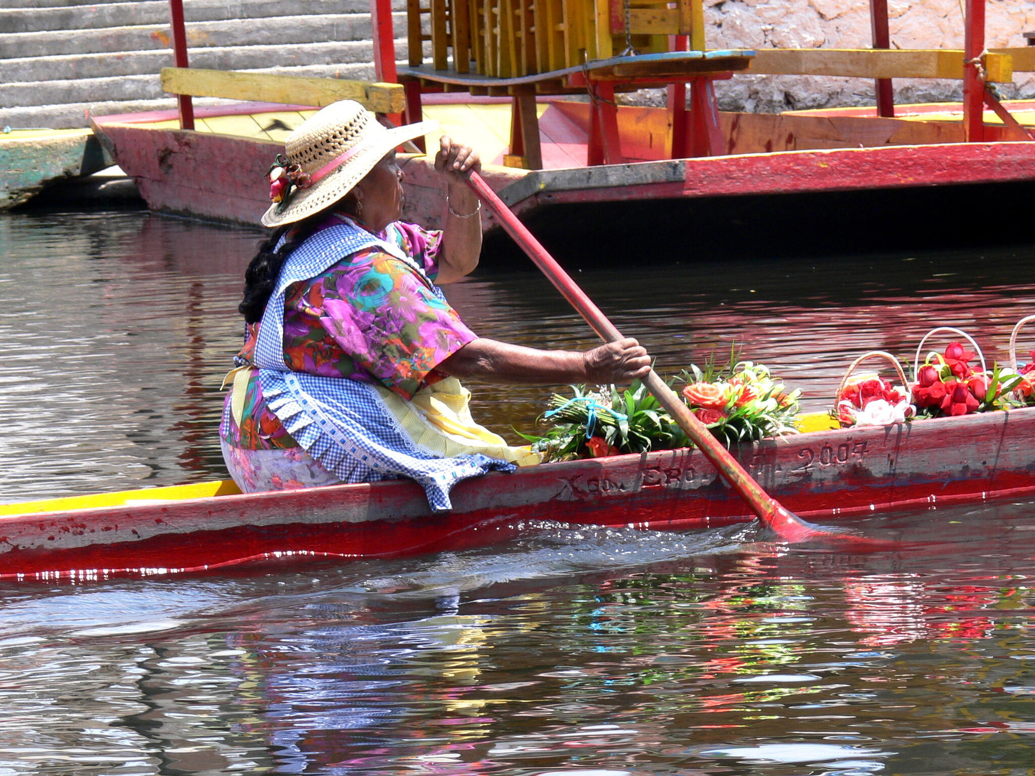 Canals of Xochimilco. Vendor of flowers in her boat.