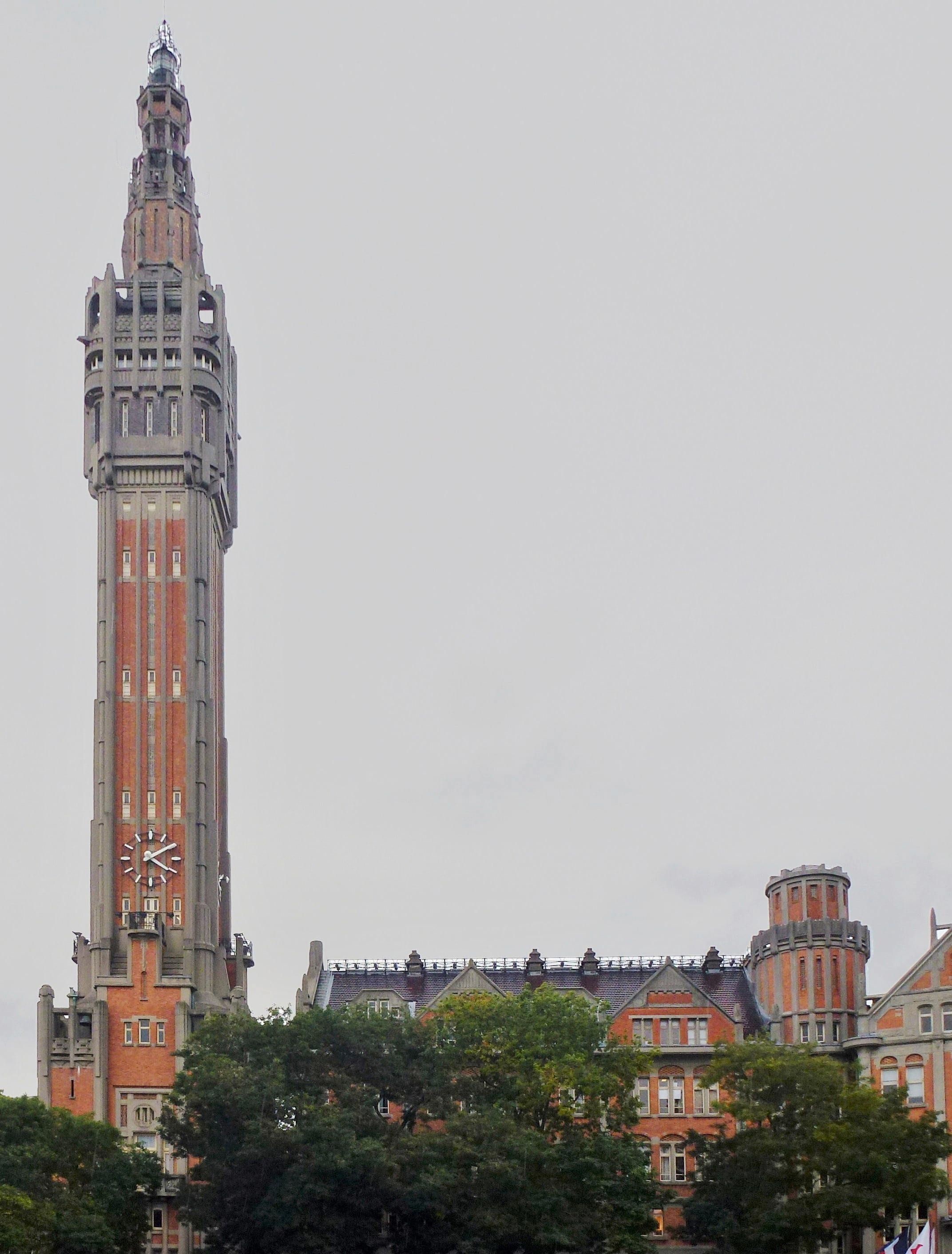 Bruges, Belgium: the medieval belfry, seen from the Steenstraat