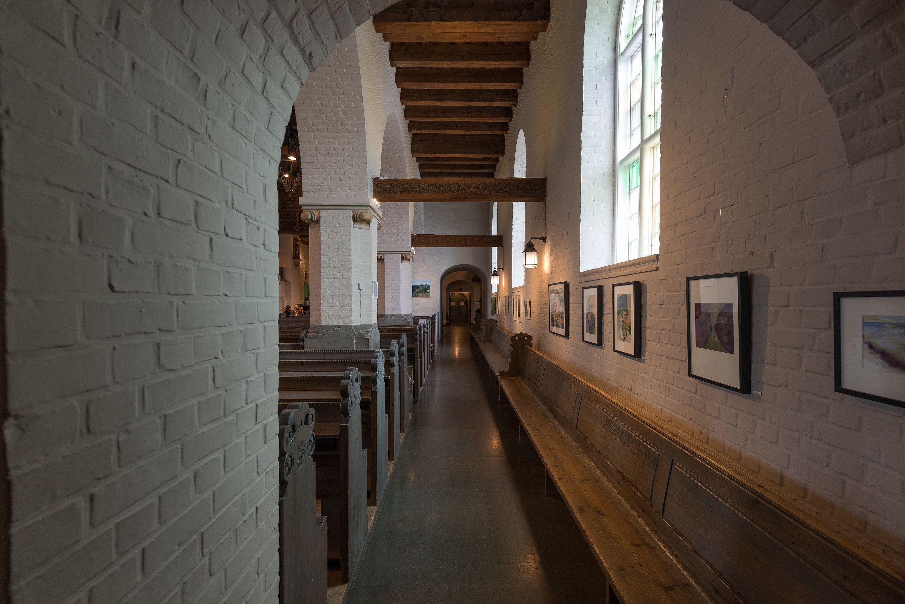 Side-aisle in Masthuggskyrkan (Masthugget Church) built in 1914. Gothenburg, Sweden. The church represents the national romantic style in Nordic…