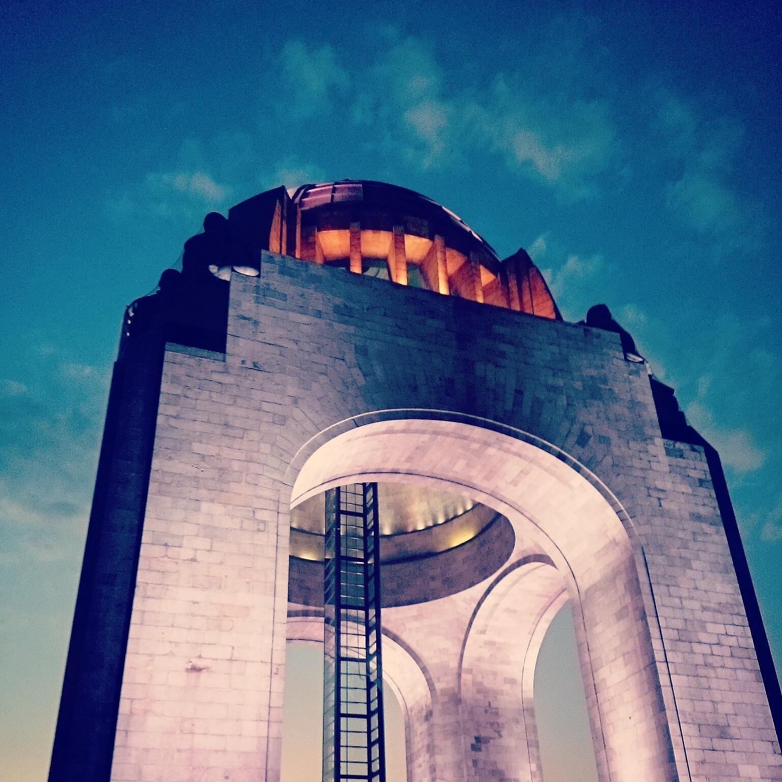 Low-angle shot from the Monument to the Revolution located in Republic Square in downtown Mexico Ciy. The total height of the landmark is 67 meters tall and it was finished in 1938.