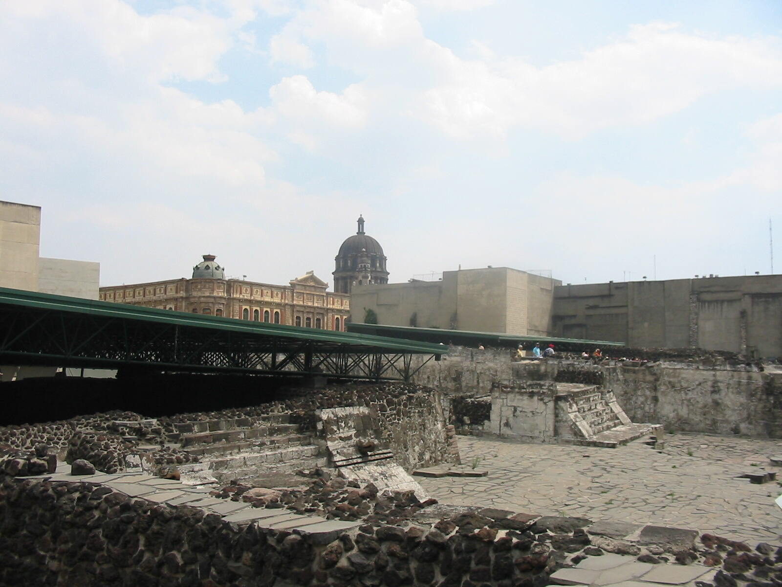 View of Eagle building and building A in the Templo Mayor complex. The ruins of the main temple are in the background