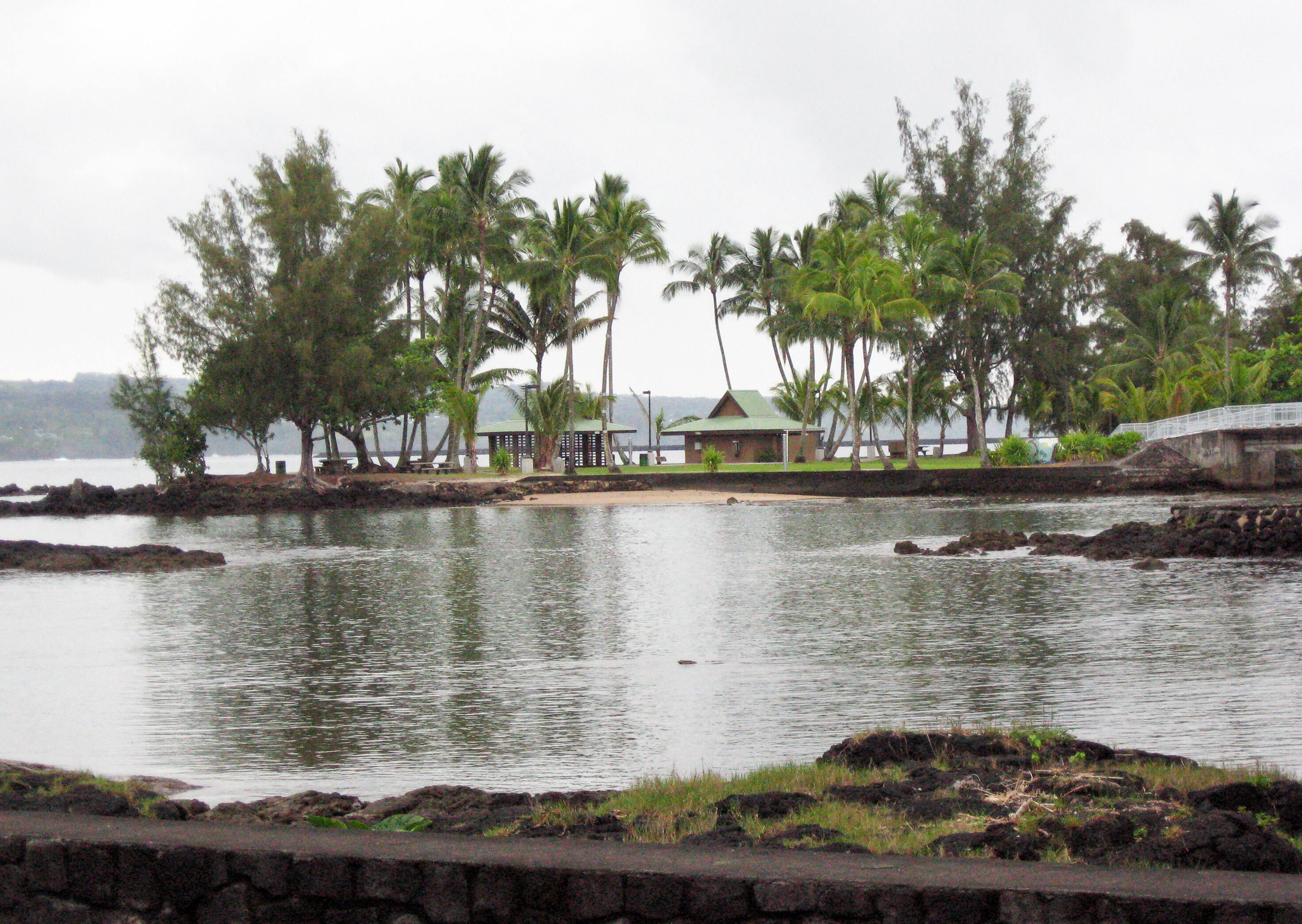 Coconut Island (Hawaiian name: Moku Ola or island of life) is a small park in Hilo Bay, on the island of Hawai'i. It was the site of an ancient healing temple, and used in World War two to train for amphibious landings.